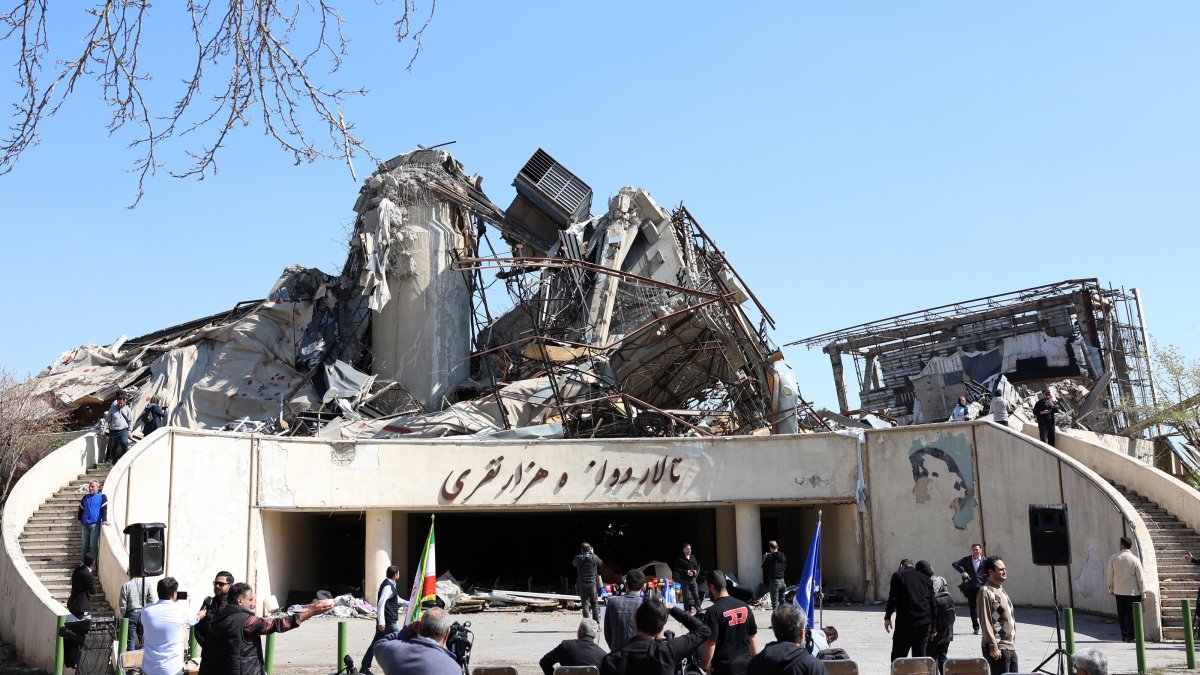 Media personnel work in front of the damaged Azadi sports complex in Tehran, Iran, April 3, 2026. (EPA Photo)