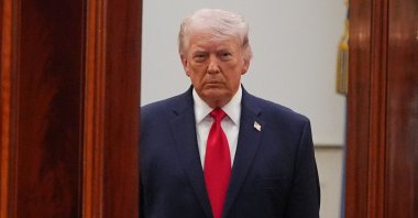 U.S. President Donald Trump arrives to speak at a televised address on the conflict in the Middle East from the Cross Hall of the White House, Washington, U.S., April 1, 2026. (AFP Photo)