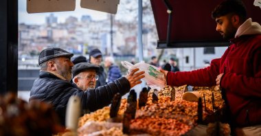 People shop in the famous Eminönü neighbourhood, Istanbul, Türkiye, March 19, 2026. (AA Photo)