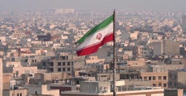 An Iranian flag waves as the U.S.-Israel war with Iran resumes, Tehran, Iran, April 3, 2026. (DHA Photo)