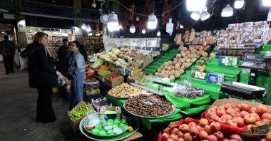 Iranians shop for food at the Tajrish Bazaar, Tehran, Iran, March 7, 2026. (AFP Photo)