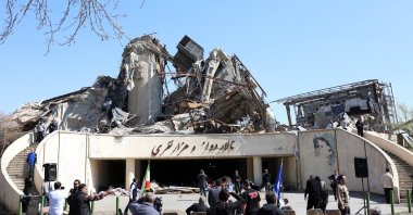 Media personnel work in front of the damaged Azadi sports complex in Tehran, Iran, April 3, 2026. (EPA Photo)