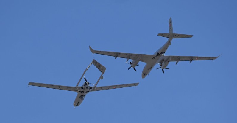 The Bayraktar TB2 (bottom) and Akıncı combat drones fly over Edirne, northwestern Türkiye, March 26, 2026. (AA Photo)