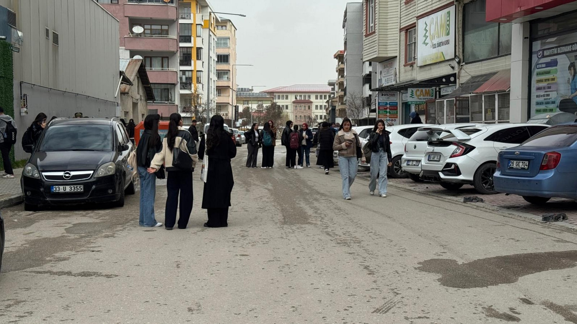People gather in the street following a magnitude 5.2 earthquake in eastern Van province, Türkiye, April 4, 2026. (AA Photo)