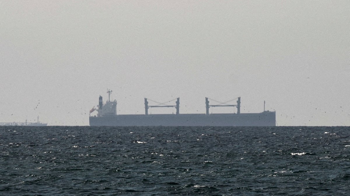 A cargo ship in the Gulf, near the Strait of Hormuz, as seen from northern Ras al-Khaimah, near the border with Oman’s Musandam governance, amid the U.S.-Israeli conflict with Iran, in United Arab Emirates, March 11, 2026. (Reuters Photo)