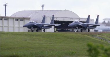 U.S F-15 fighters are parked at the Kadena Air Base airfield in Kadena town, Okinawa, Japan, Aug. 24, 2023. (AP Photo)