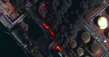 A satellite near-infrared image shows smoke rising from Russia's Baltic port of Ust-Luga after a Ukrainian attack, in Ust-Luga, Leningrad Oblast, March 27, 2026. (Reuters Photo)