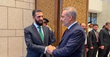 Foreign Minister Hakan Fidan (R) is received by Syrian President Ahmed al-Sharaa, Damascus, Syria, April 5, 2026. (AA Photo)