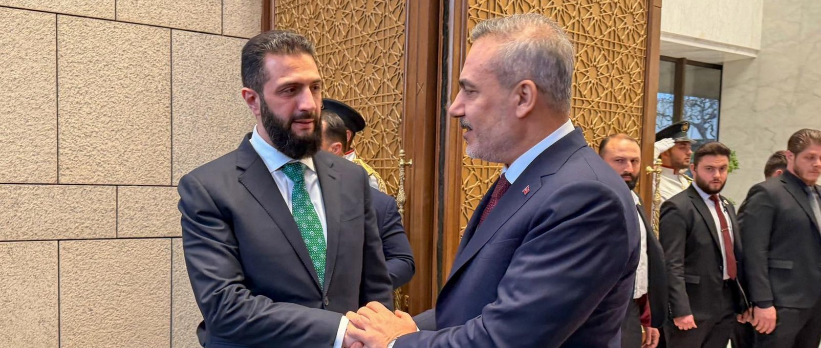 Foreign Minister Hakan Fidan (R) is received by Syrian President Ahmed al-Sharaa, Damascus, Syria, April 5, 2026. (AA Photo)