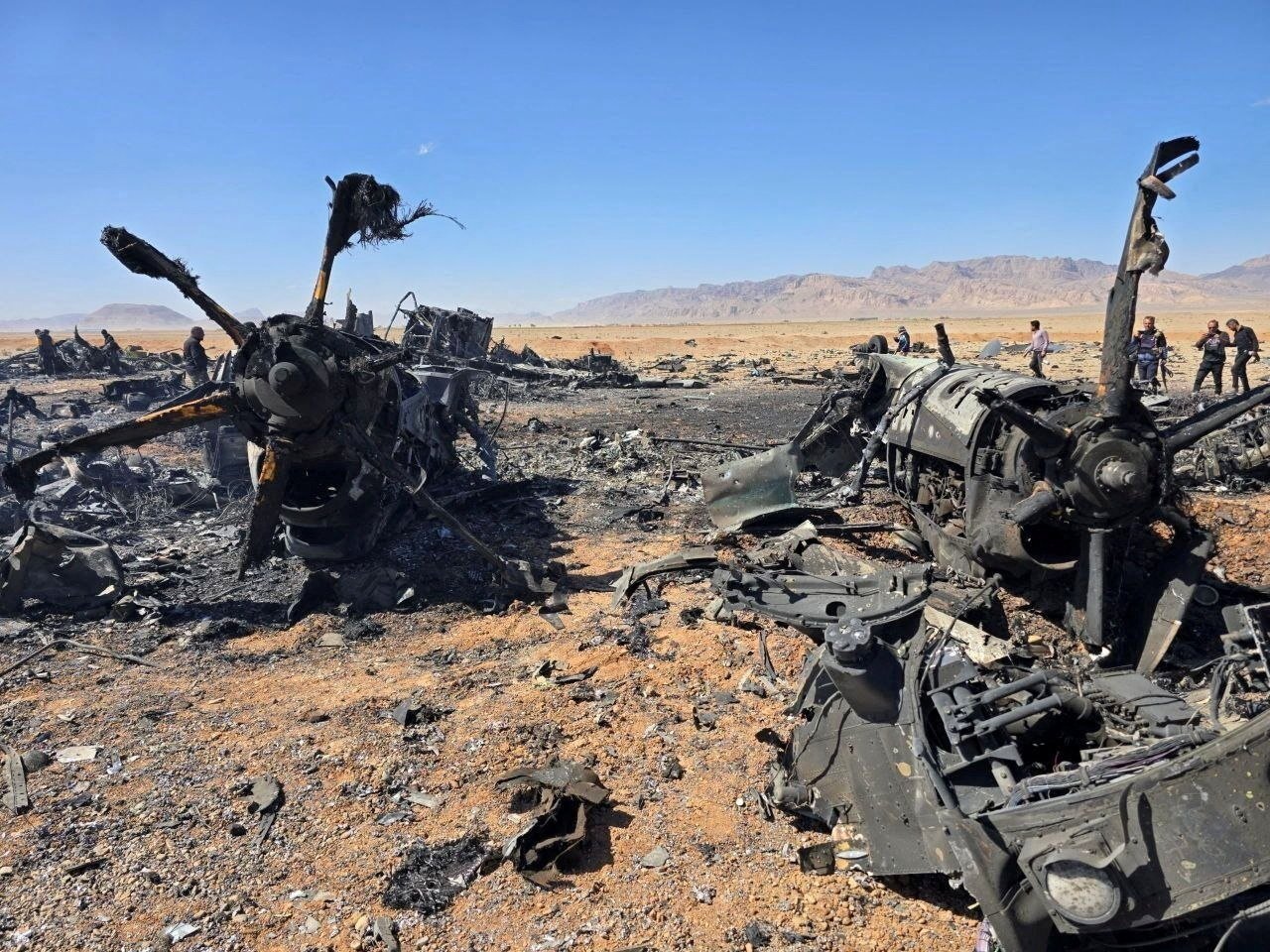 The wreckage of an American aircraft and a helicopter rotor is seen in Isfahan, Iran, April 5, 2026. (Reuters Photo)