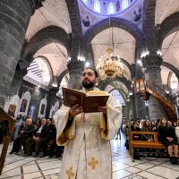Faithful attend the Palm Sunday service at the Cathedral of Our Lady of Dormition, headquarters of the Melkite Greek Catholic Patriarchate, in Damascus, Syria, March 29, 2026. (AFP Photo)