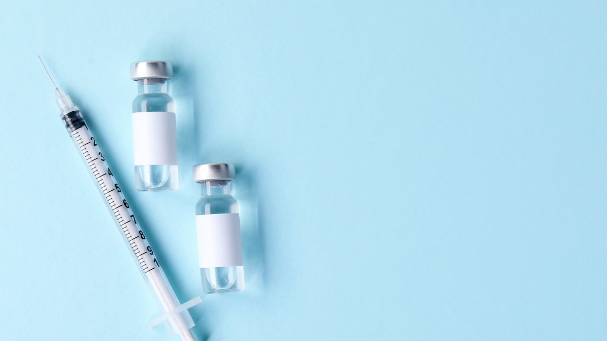 An image of a vaccine in vials and syringe. (Shutterstock Photo)