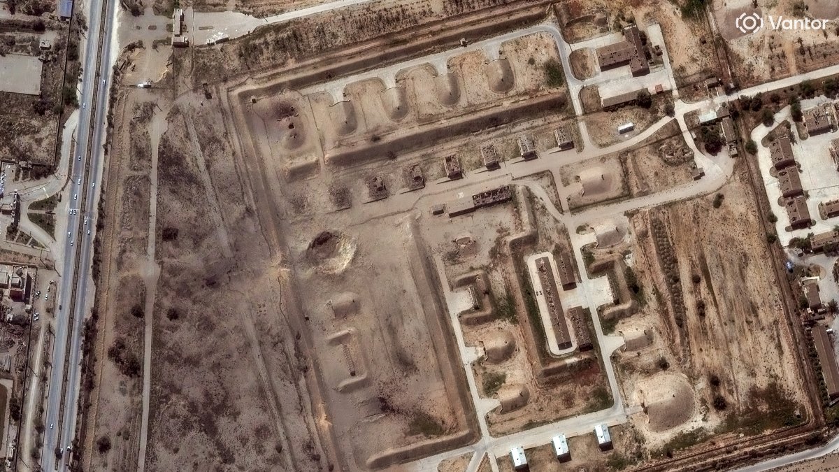 A satellite image shows a large crater on a bunkered storage area at Bushehr airbase, following reported airstrikes, amid the U.S.-Israeli attacks, Iran, March 7, 2026. (Reuters Photo)