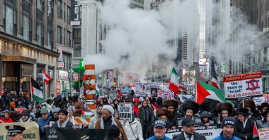 People march during a protest against military actions in Iran and Palestine, New York, U.S., March 13, 2026. (EPA Photo)