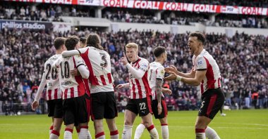 PSV Eindhoven's Dutch Guus Til (L) celebrates with teammates after scoring his team's third goal during the Dutch Eredivisie football match between PSV Eindhoven and FC Utrecht at Philips Stadion, Eindhoven, Netherlands, April 4, 2026. (AFP Photo)