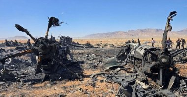 The wreckage of an American aircraft and a helicopter rotor is seen in Isfahan, Iran, April 5, 2026. (Reuters Photo)
