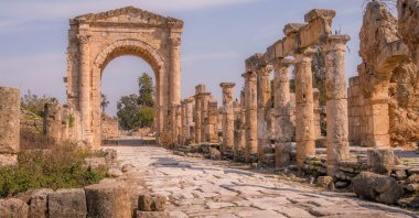 The Tyre necropolis triumphal arch and the road with columns at the UNESCO archaeological site in Sour, Lebanon. (Shutterstock Photo)