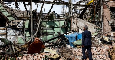 Iran's Minister of Science Hossein Simaee Sarraf inspects the damage at the research building of the Shahid Beheshti University, which was damaged by a strike, amid the U.S.-Israeli conflict with Iran, in Tehran, Iran, April 4, 2026.  (West Asia News Agency via Reuters)