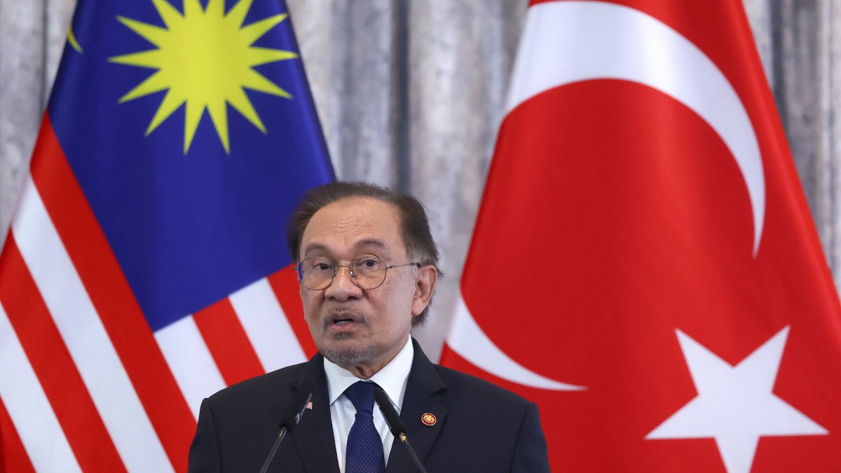 Malaysian Prime Minister Anwar Ibrahim attends a joint news conference with President Recep Tayyip Erdoğan during their meeting, Putrajaya, Malaysia, Feb. 11, 2025. (AP Photo)