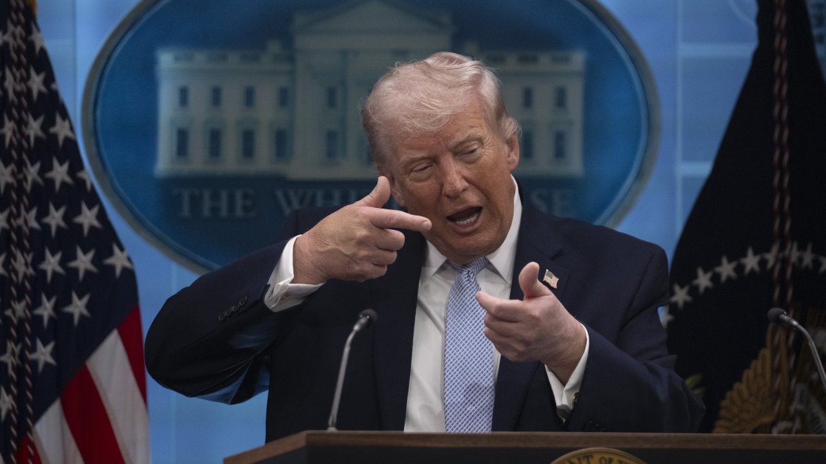 Donald Trump gestures during a media briefing at the White House, Washington D.C., U.S. April 7, 2026.
