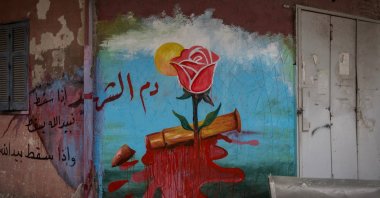 A mural by Mohamed Younes, a 50-year-old visual artist, on a wall of a building damaged in an Israeli strike, amid escalating hostilities between Israel and Hezbollah, Tyre, Lebanon, April 6, 2026. (Reuters Photo)