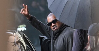 Kanye West gestures upon arriving at Shanghai Pudong International Airport, Shanghai, China, July, 11, 2025. (AFP Photo)