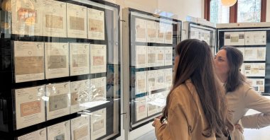 Visitors explore the “Ottoman Postal History” exhibition at the PTT building, Istanbul, Türkiye, April 4, 2026. (AA Photo)