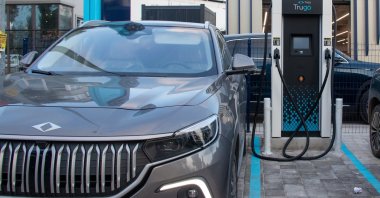 A Togg T10X is seen at a charging station, Antalya, Türkiye, March 11, 2023. (Shutterstock Photo)