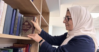 Sehergül Koç studies at a university library, Zonguldak, Türkiye, April 1, 2026. (AA Photo)
