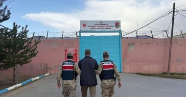 Gendarmerie officers escort a FETÖ convict to prison, Erzurum, eastern Türkiye, Nov. 7, 2025. (AA Photo)