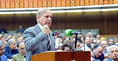 In this handout photograph taken and released by Pakistan&amp;amp;#039;s Press Information Department (PID) on Nov. 12, 2025, Pakistan&amp;amp;#039;s Prime Minister Shehbaz Sharif addresses parliament session on constitutional amendment granting lifetime immunity to the president and current army chief Asim Munir, in Islamabad. (AFP File Photo)