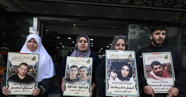 Relatives of Palestinian prisoners hold portraits during a rally in the Israeli-occupied West Bank city of Nablus, Palestine, March 31, 2026. (AFP Photo)