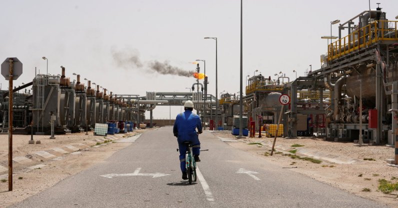 A worker rides a bicycle at the Zubair oil field in Basra, Iraq, April 6, 2026. (Reuters Photo)