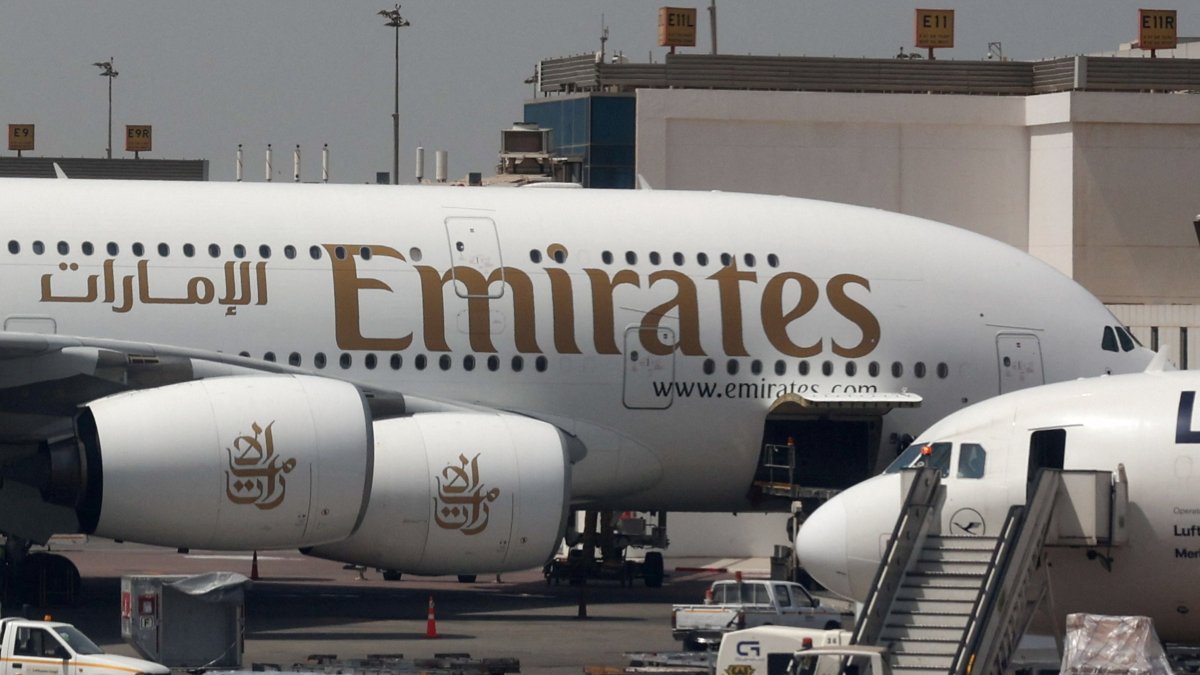 An Emirates aircraft is seen through the window of a Middle East Airlines airplane at Cairo International Airport, amid the U.S.-Israeli conflict with Iran, Cairo, Egypt, March 31, 2026. (Reuters Photo)