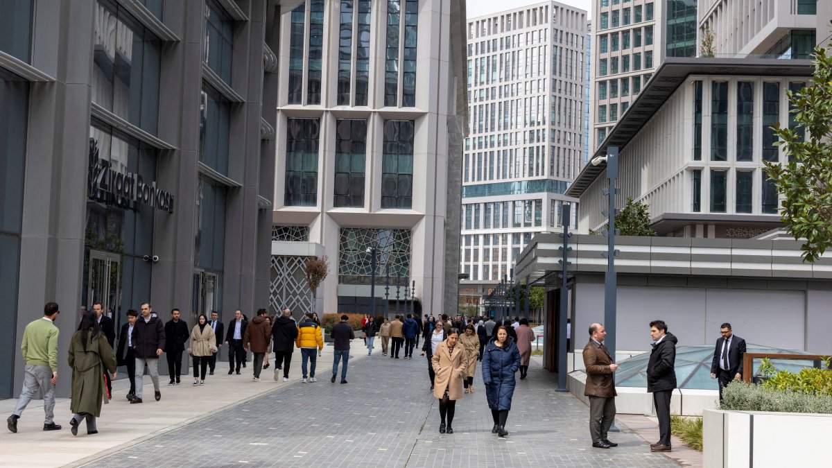 People walk inside the complex of Istanbul Financial Center (IFC) in Istanbul, Türkiye, April 3, 2026. (Reuters Photo)