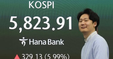 A financial data screen in the dealing room of Hana Bank shows the benchmark Korea Composite Stock Price Index (KOSPI) having logged an intraday high of 5,823.93, up 5.99% from the previous session, in early trading, after South Korean shares rallied on reports of a cease-fire between the U.S. and Iran, Seoul, South Korea, April 8, 2026. (EPA Photo)