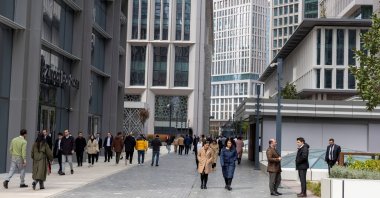 People walk inside the complex of Istanbul Financial Center (IFC) in Istanbul, Türkiye, April 3, 2026. (Reuters Photo)