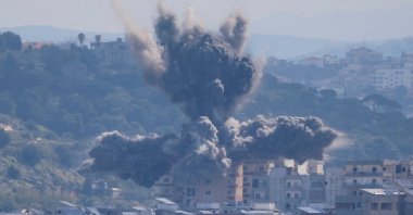 Smoke rises from an explosion in the Abbasiyeh neighbourhood following an Israeli strike, in Tyre, Lebanon, April 8, 2026. REUTERS/Adnan Abidi