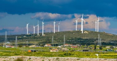 Wind turbines are seen on the hills of the popular resort town of Alaçatı, Izmir, western Türkiye, May 8, 2024. (Shutterstock Photo)
