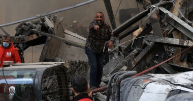 A man gestures as rescuers work at the site of an Israeli strike in Beirut, Lebanon, April 8, 2026. (Reuters Photo)
