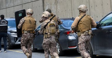 Turkish Police's special forces walk at the scene, after gunfire was heard near the building housing the Israeli consulate, in Istanbul, Türkiye, April 7, 2026. (Reuters Photo)