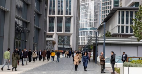 People walk inside the complex of Istanbul Financial Center (IFC) in Istanbul, Türkiye, April 3, 2026. (Reuters Photo)