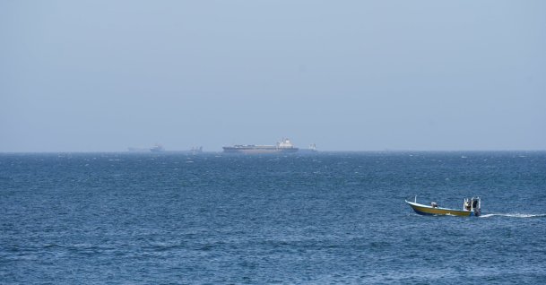 Vessels and boats are off the coast of Musandam governorate, overlooking the Strait of Hormuz, Oman, April 8, 2026. (Reuters Photo)