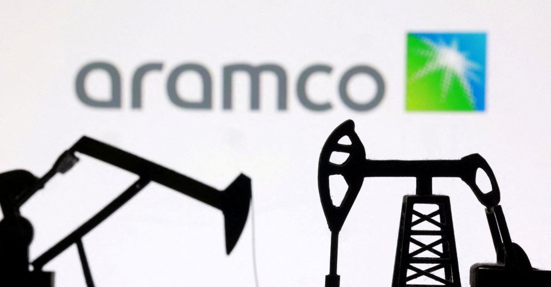 3D-printed oil pump jacks and the Saudi Aramco logo appear in this illustration, March 2, 2026. (Reuters Photo)