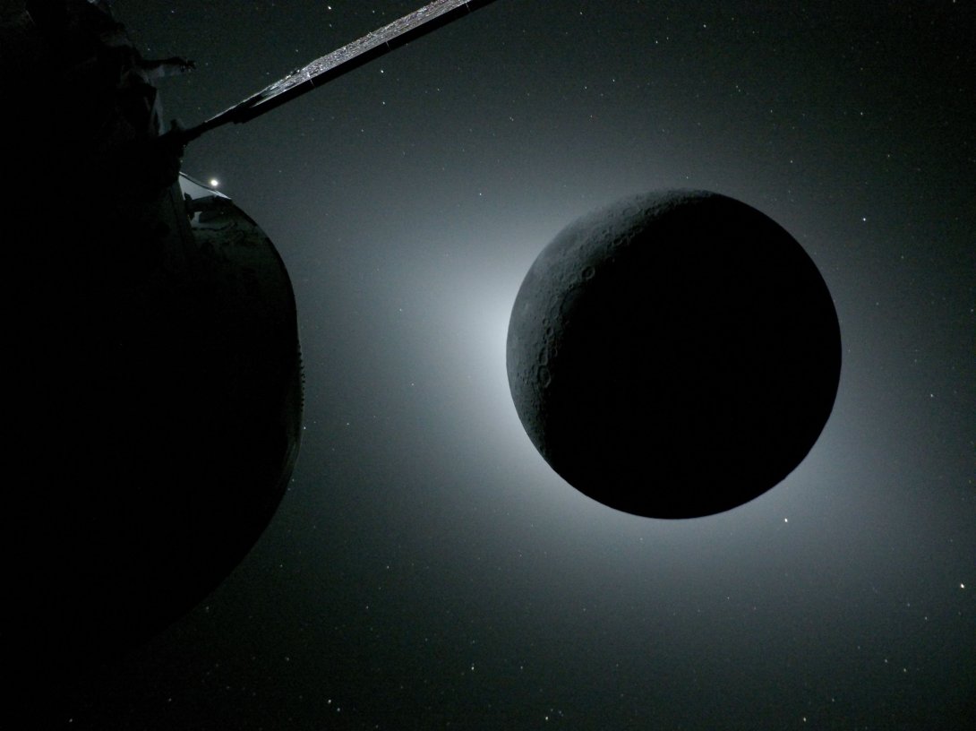 The Orion spacecraft (L) and the Moon backlit by the Sun during a solar eclipse on April 6, 2026. (AFP Photo)