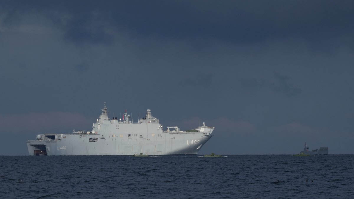 A Turkish naval ship provides support during an amphibious landing operation conducted by the Allied Reaction Force during NATO-led military exercises on Wessek Beach, Putlos, Germany, Feb. 18, 2026. (AP Photo)