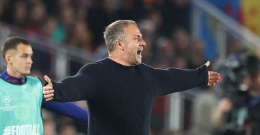 Barcelona's Hans Flick gestures on the touchline during the UEFA Champions League quarterfinal first leg football match against Atletico Madrid at Camp Nou Stadium, Barcelona, Spain, April 8, 2026. (AFP Photo)