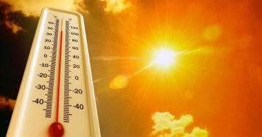 A thermometer shows high temperature. (Shutterstock Photo)