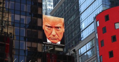 An image of U.S. President Donald Trump is displayed on a digital billboard in Times Square in New York, U.S., April 8, 2026. (AFP Photo)