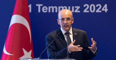 Treasury and Finance Minister Mehmet Şimşek speaks at an event in Istanbul, Türkiye, July 11, 2024. (Reuters Photo)